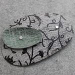 Linen Futures anodised aluminium brooch made in Wales by Mandy Nash